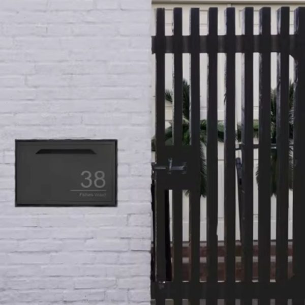 parcel letterbox in fence